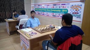 Praneeth facing the camera missed his GM norm by losing to IM Rathnakaran